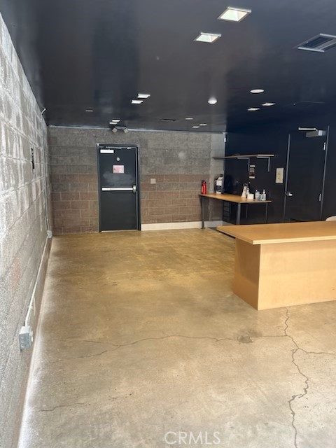 5959 Cherry Avenue Long Beach, CA 90805 - Photo 7 of 11 a view of a big room with wooden floor and windows