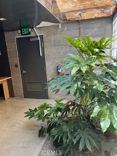 5959 Cherry Avenue Long Beach, CA 90805 - Photo 8 of 11 a backyard of a house with a yard and outdoor seating