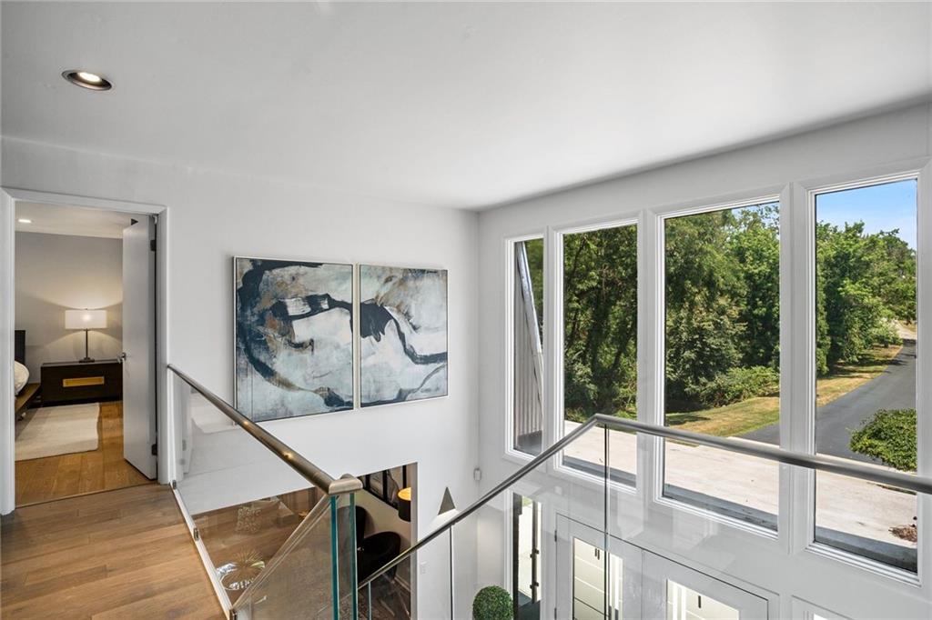 989 Braddock Road Pittsburgh, PA 15221 - Photo 19 of 50 a living room with furniture and large windows