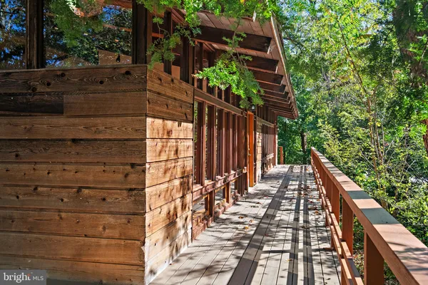 a view of balcony with wooden floor