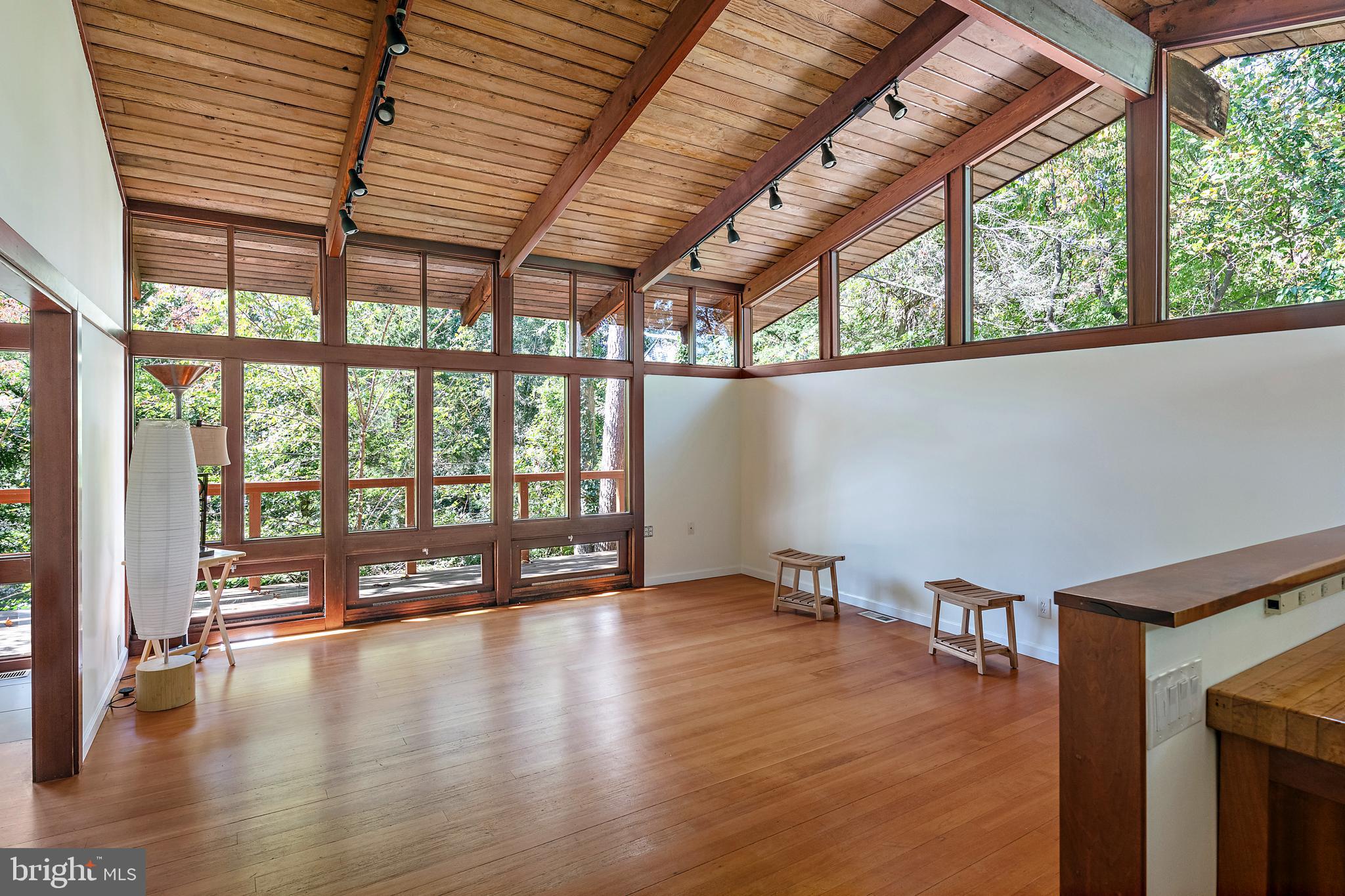 245 Haverton Road Arnold, MD 21012 - Photo 28 of 53 a view of an empty room with wooden floor and a window