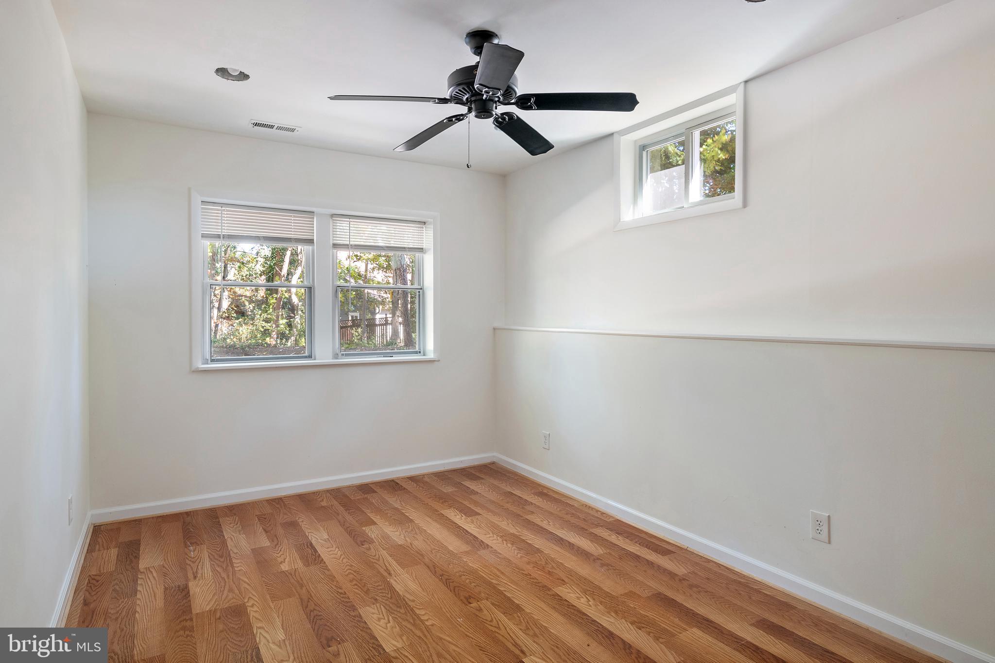 245 Haverton Road Arnold, MD 21012 - Photo 44 of 53 a view of empty room with wooden floor