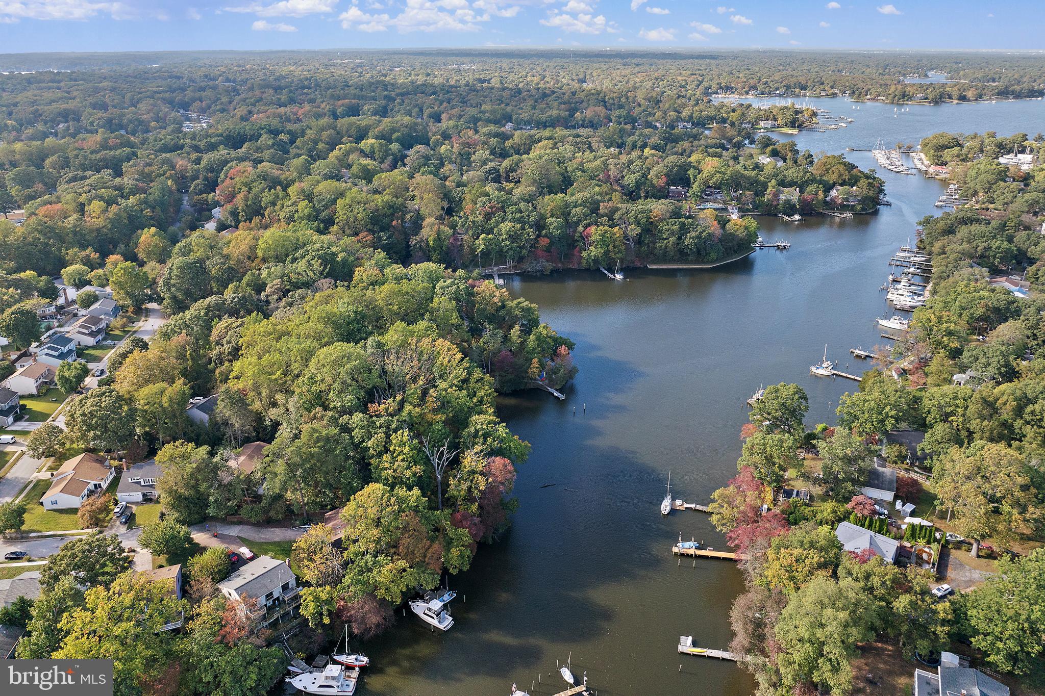 245 Haverton Road Arnold, MD 21012 - Photo 6 of 53 an aerial view of a house with a yard and lake view