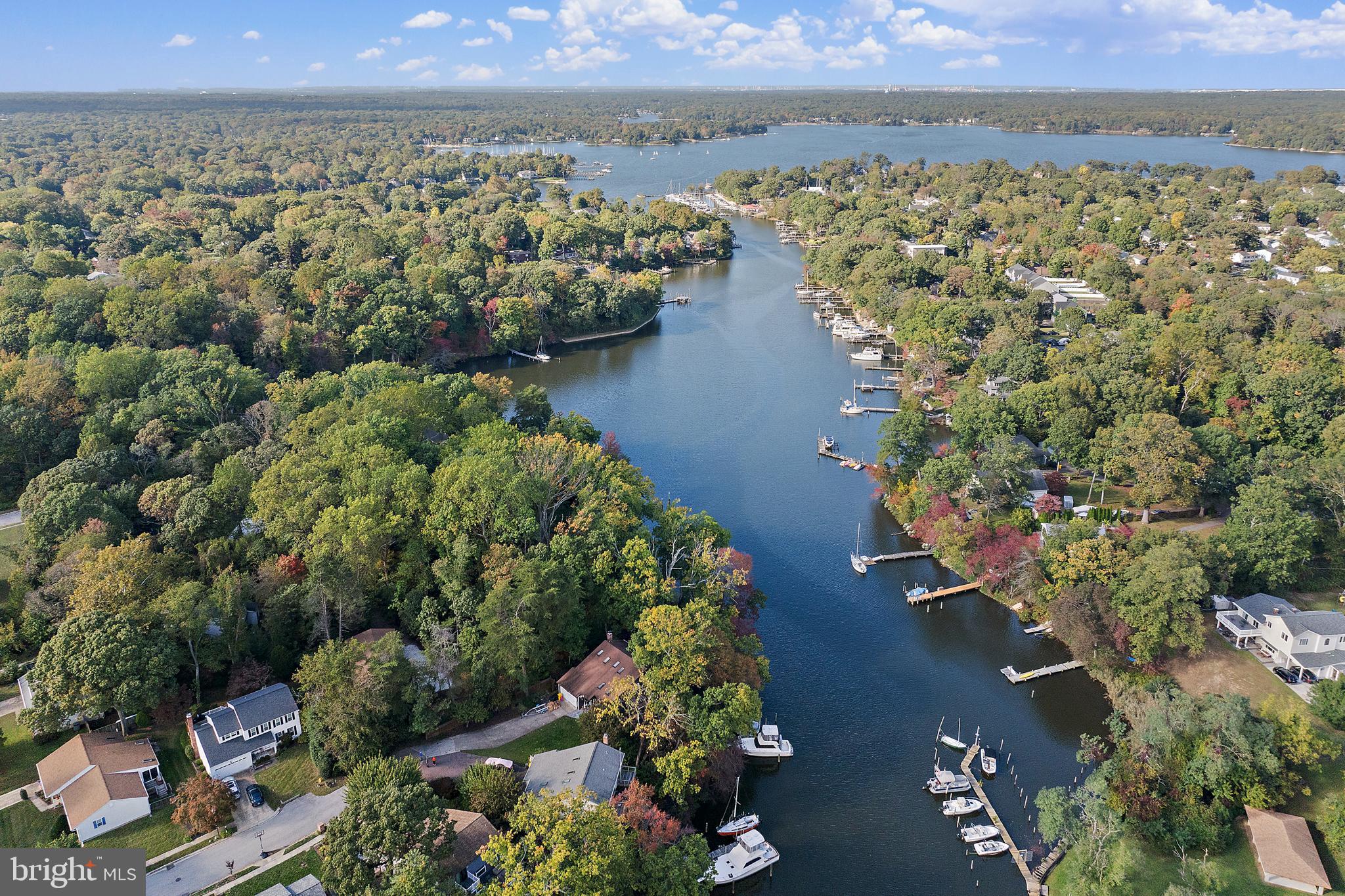 245 Haverton Road Arnold, MD 21012 - Photo 7 of 53 a view of a lake with a mountain in the background