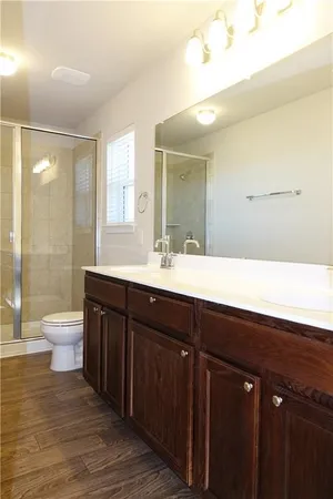 a bathroom with a sink and a toilet