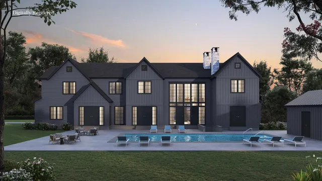 an aerial view of house with yard