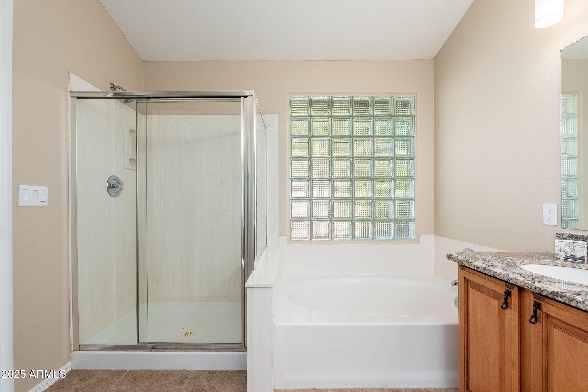 4154 East Rockledge Road Phoenix, AZ 85044 - Photo 15 of 41 a bathroom with a granite countertop bathtub shower and sink