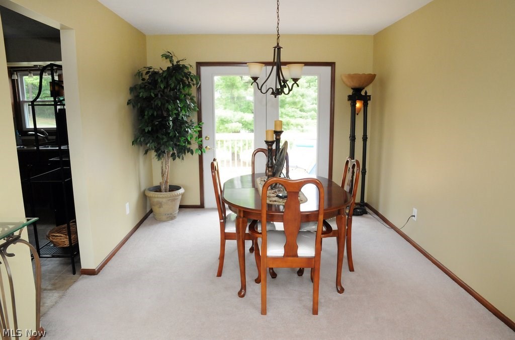 2895 Best Road Cambridge, OH 43725 - Photo 5 of 27 Dining area and walkout to new deck
