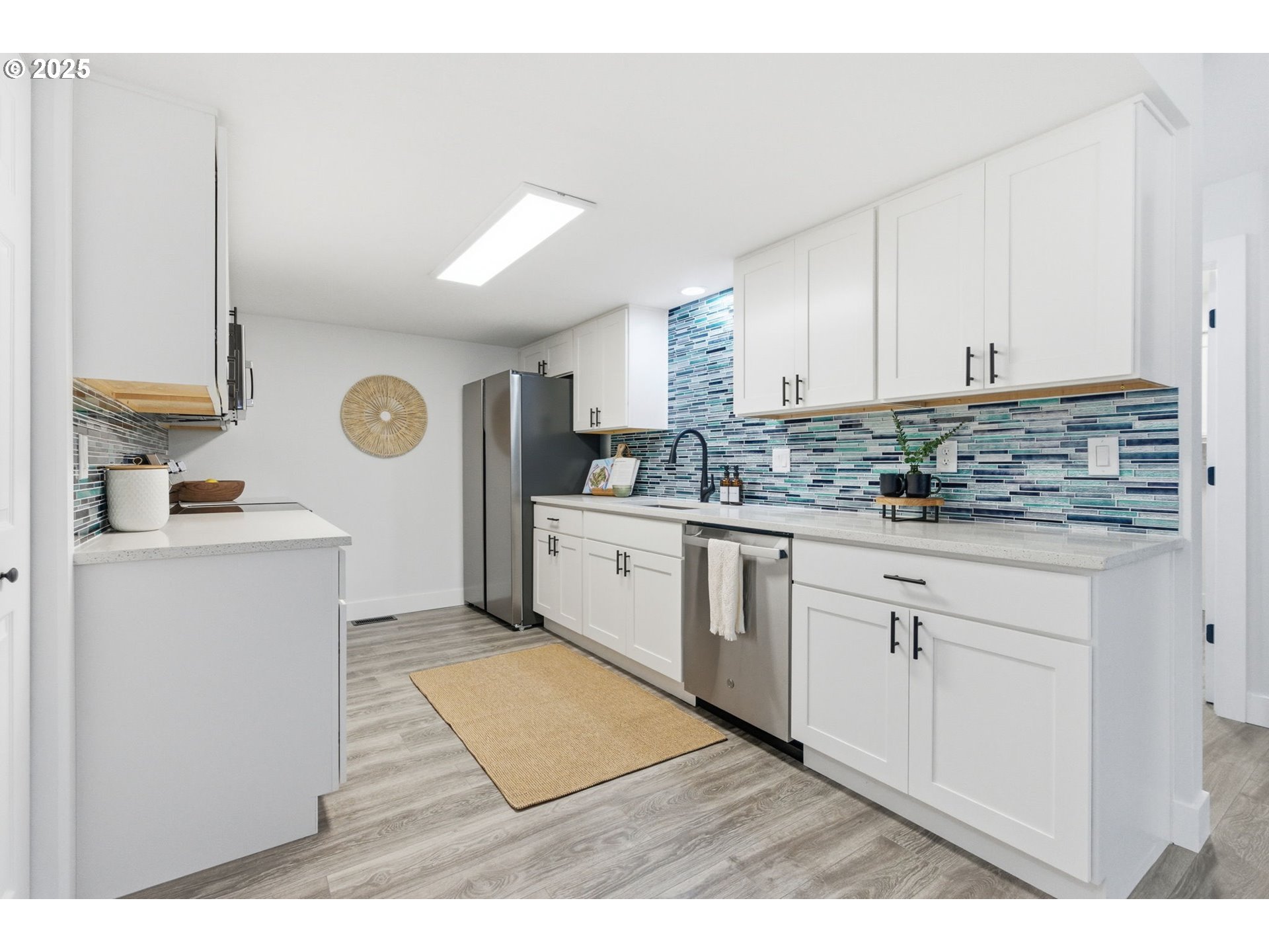512 Southwest Eastman Parkway Gresham, OR 97080 - Photo 12 of 39 a kitchen with a sink cabinets and window