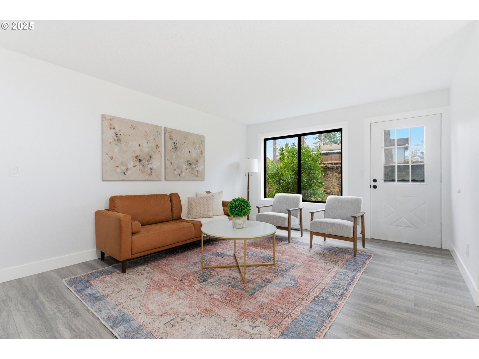 512 Southwest Eastman Parkway Gresham, OR 97080 - Photo 6 of 39 a living room with furniture and a large window