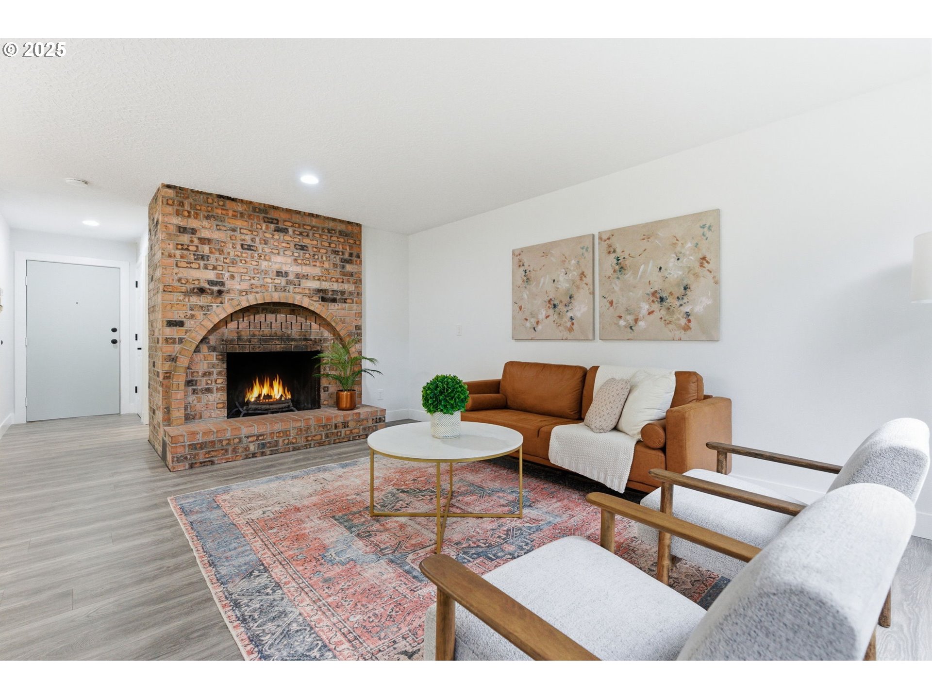 512 Southwest Eastman Parkway Gresham, OR 97080 - Photo 8 of 39 a living room with furniture and a fireplace