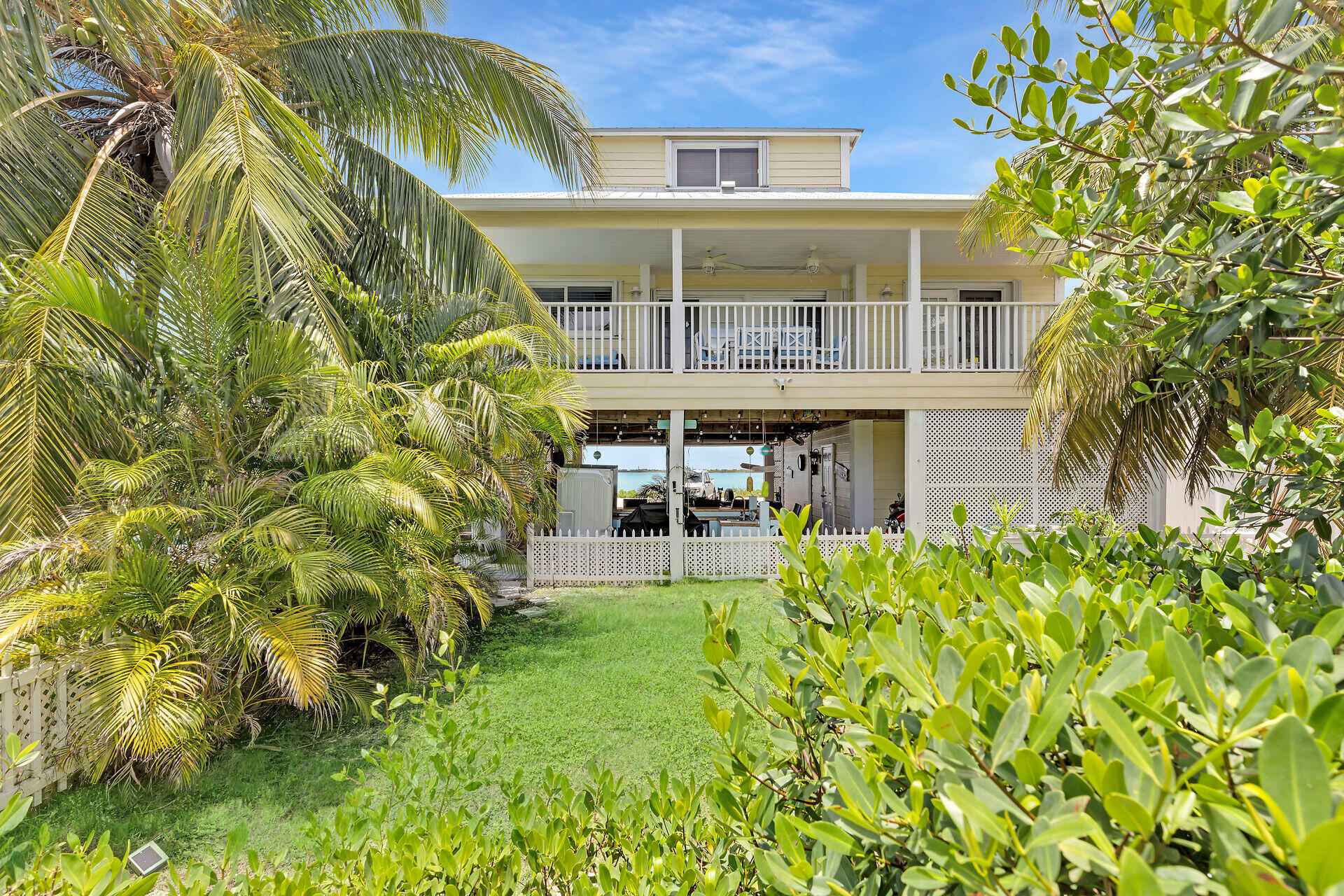 553 Indies Road Summerland Key, FL 33042 - Photo 28 of 64 View of Backyard Lanai & Fenced-In Yard