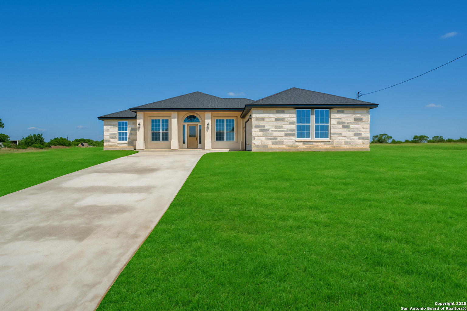171 Hidden Ranch Court Floresville, TX 78114 - Photo 1 of 1 a view of a yard in front of a house with a yard
