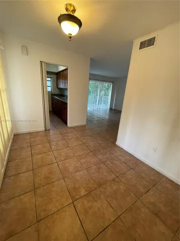 a view of livingroom with hardwood floor and window