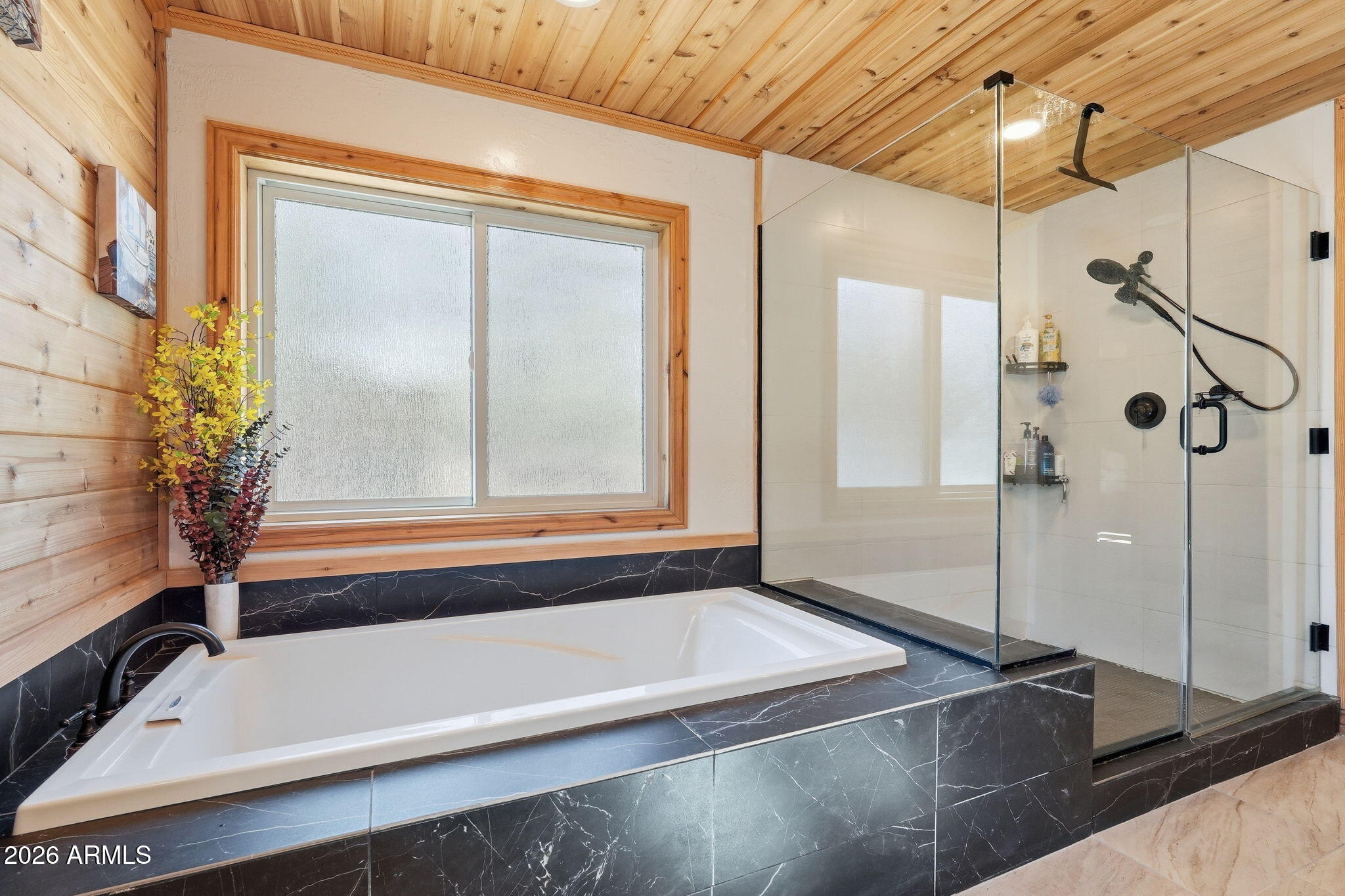2060 Gilbert Lane Overgaard, AZ 85933 - Photo 52 of 87 a bathroom with a tub and a shower