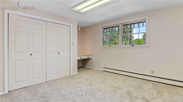 5417 Madera Road Colorado Springs, CO 80918 - Photo 36 of 43 Lower Level Bedroom 3