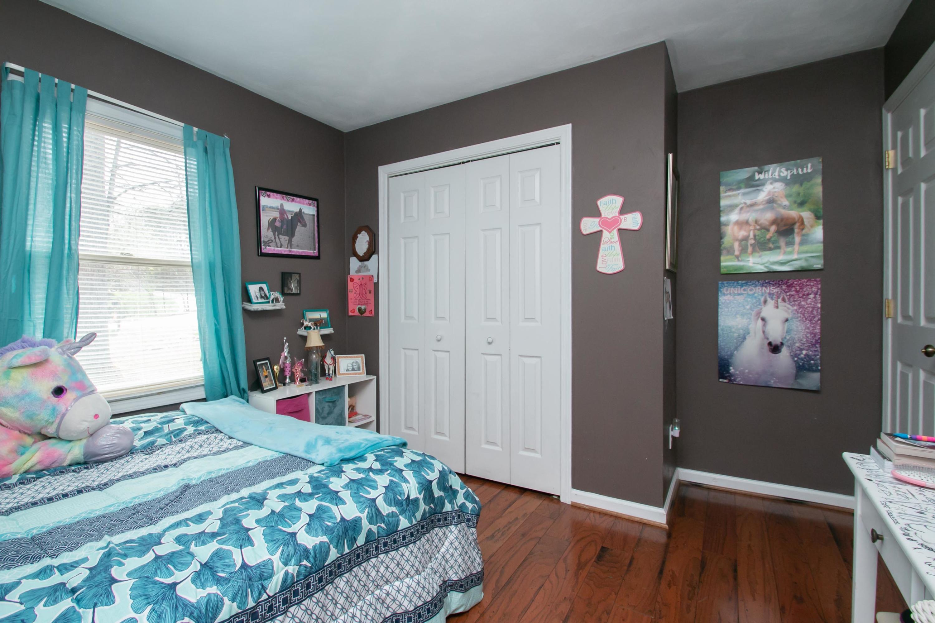 1037 Chandler Road Goodview, VA 24095 - Photo 12 of 21 a bedroom with a bed and a window