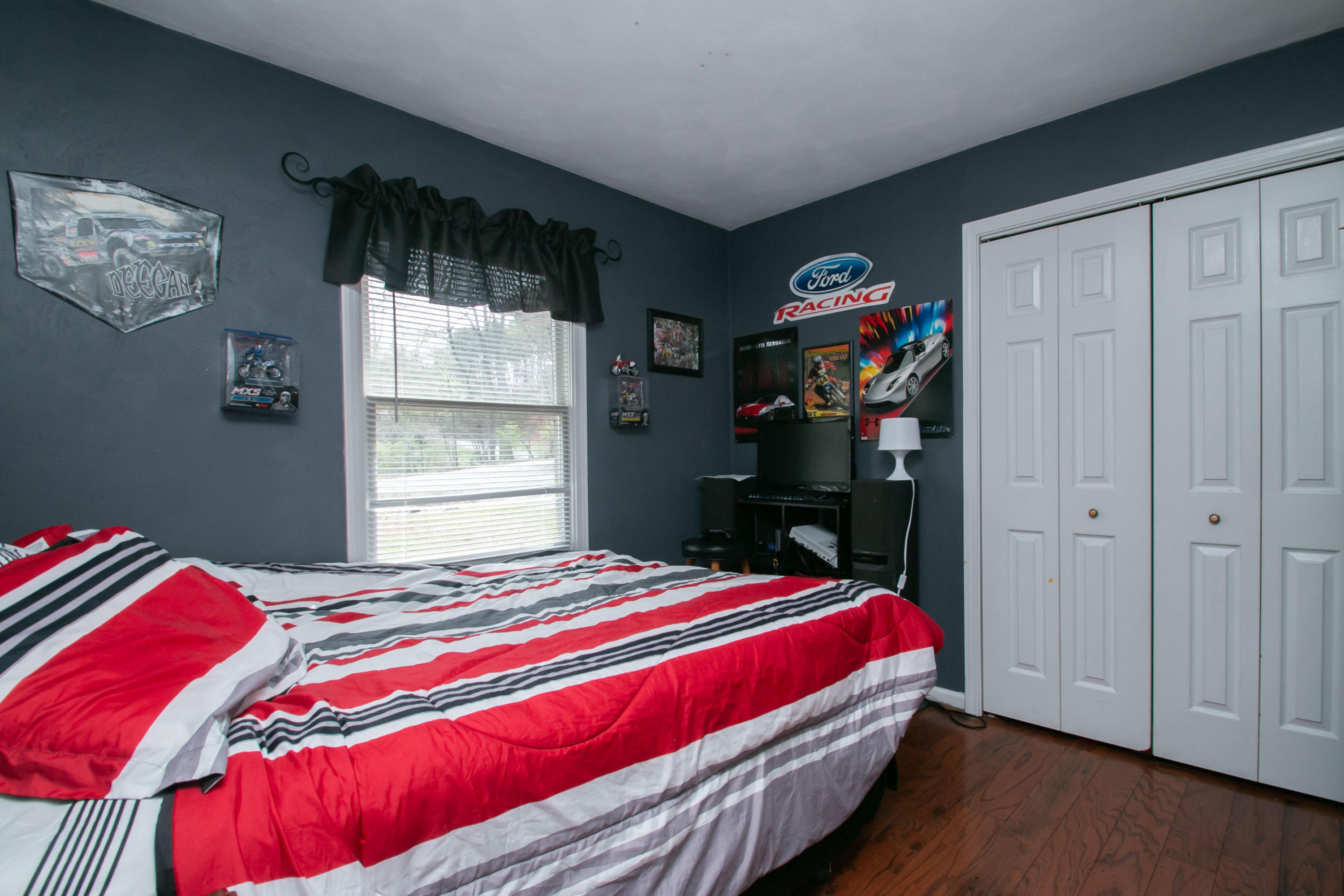 1037 Chandler Road Goodview, VA 24095 - Photo 14 of 21 a bedroom with a bed and a window