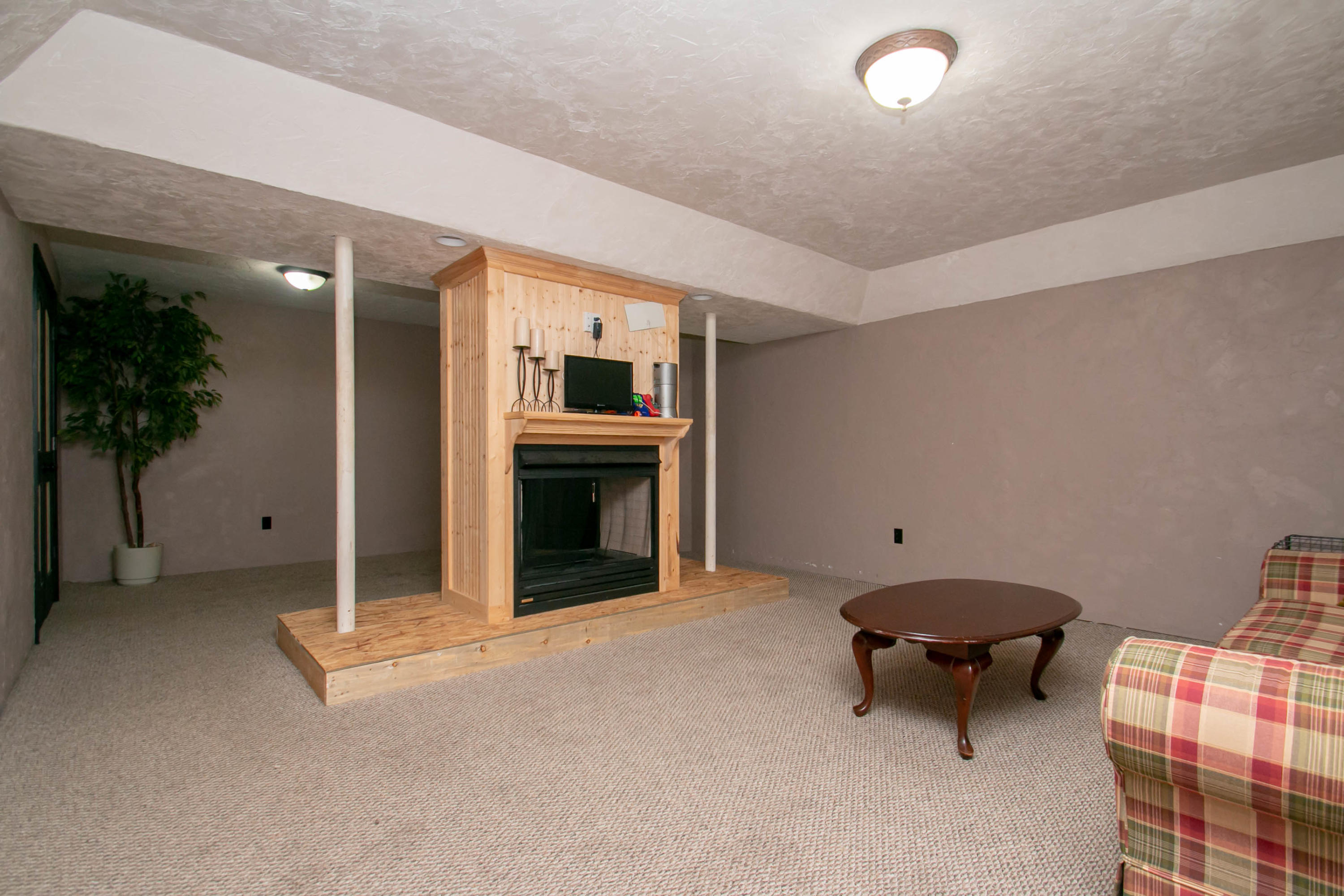 1037 Chandler Road Goodview, VA 24095 - Photo 15 of 21 a view of livingroom with furniture and fireplace