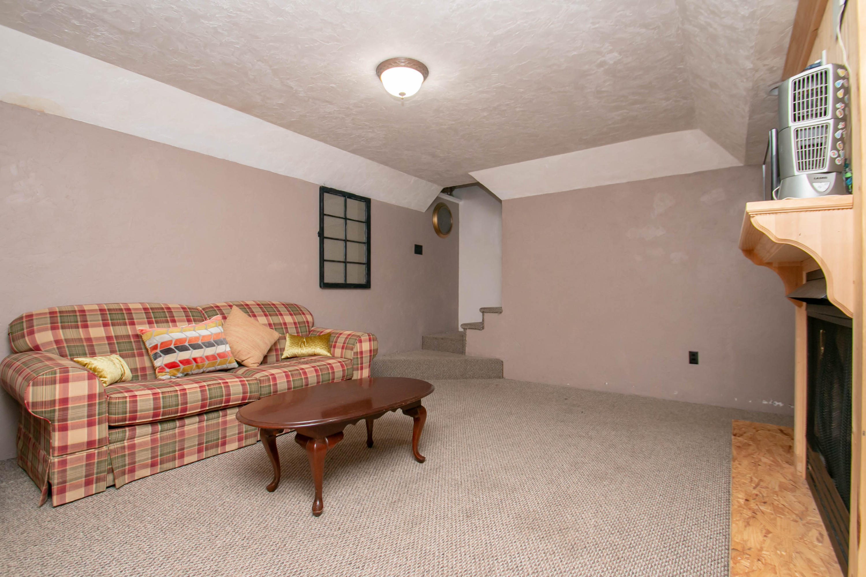 1037 Chandler Road Goodview, VA 24095 - Photo 16 of 21 a reading room with furniture and a window