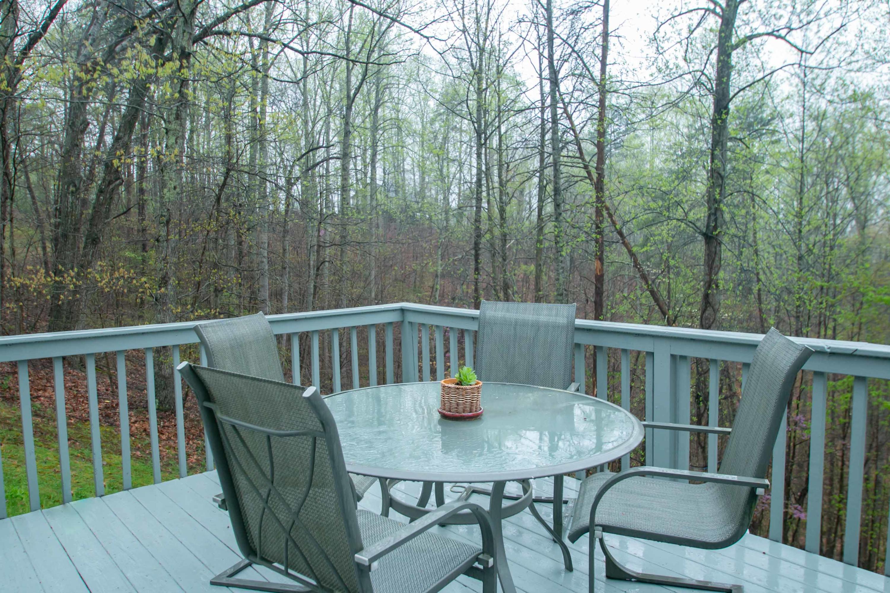 1037 Chandler Road Goodview, VA 24095 - Photo 2 of 21 a view of a balcony with table and chairs