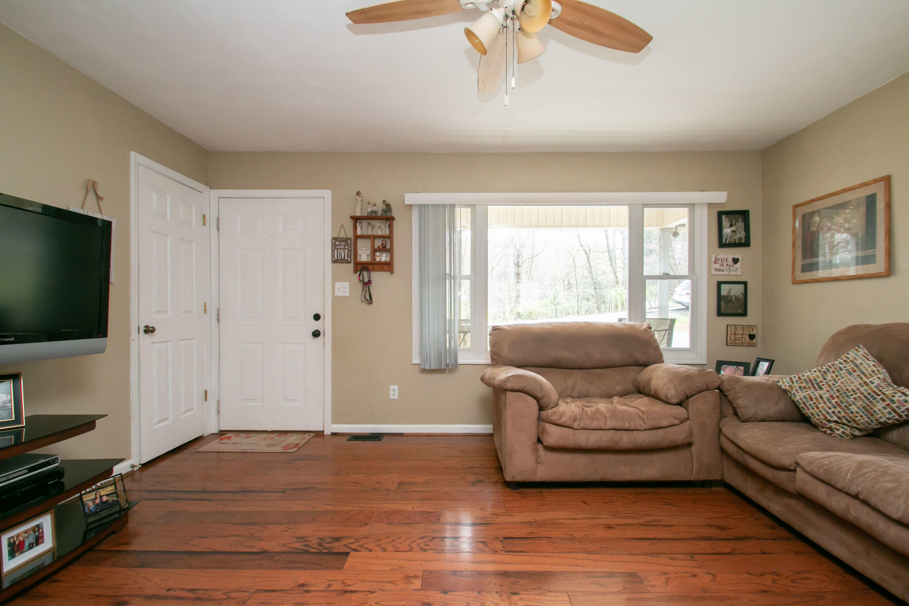 1037 Chandler Road Goodview, VA 24095 - Photo 4 of 21 a living room with furniture and a flat screen tv