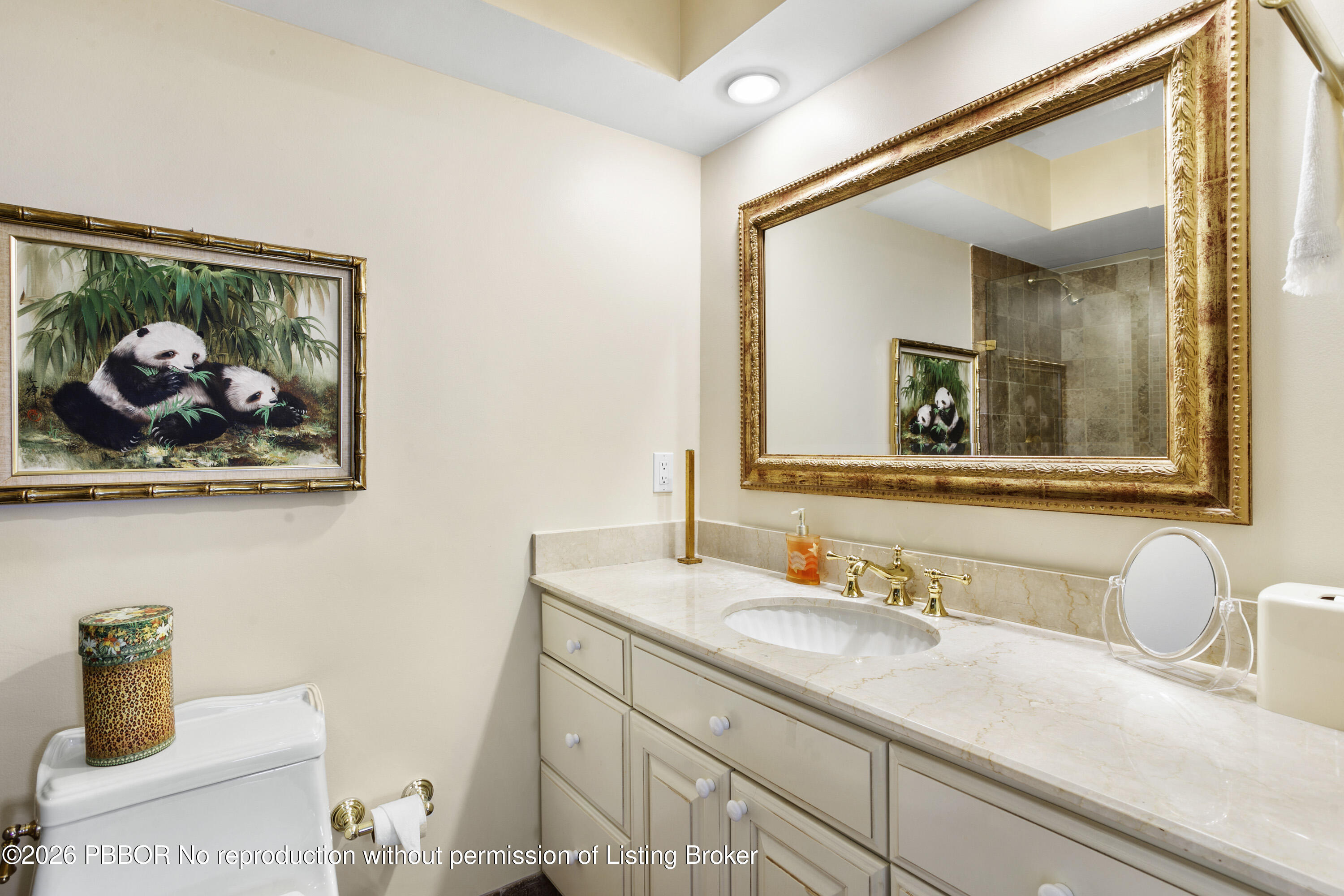 380 Cocoanut Row, Unit 1 Palm Beach, FL 33480 - Photo 19 of 32 a bathroom with a sink and a mirror