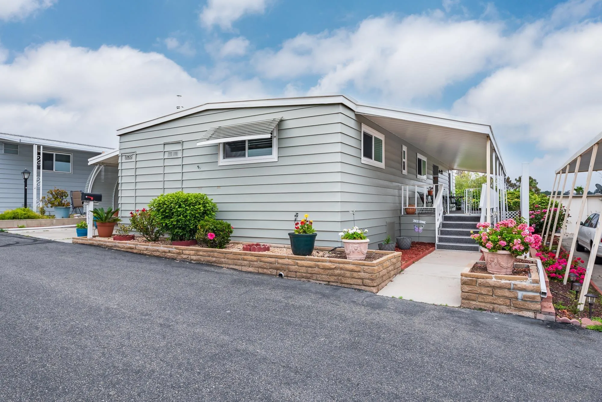 a view of the house with a patio