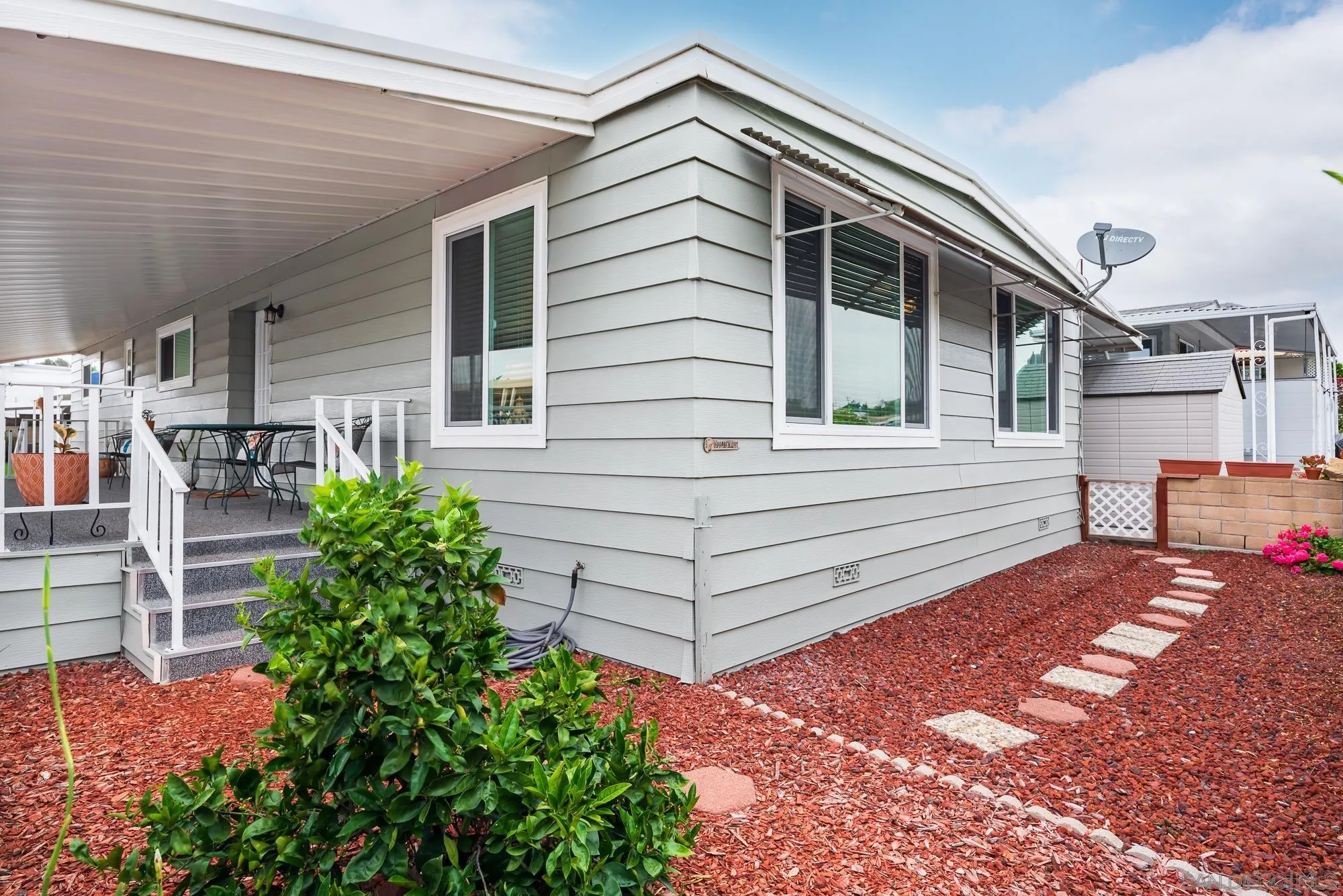 262 Brookside Lane Oceanside, CA 92056 - Photo 28 of 43 a view of a house with backyard and sitting area