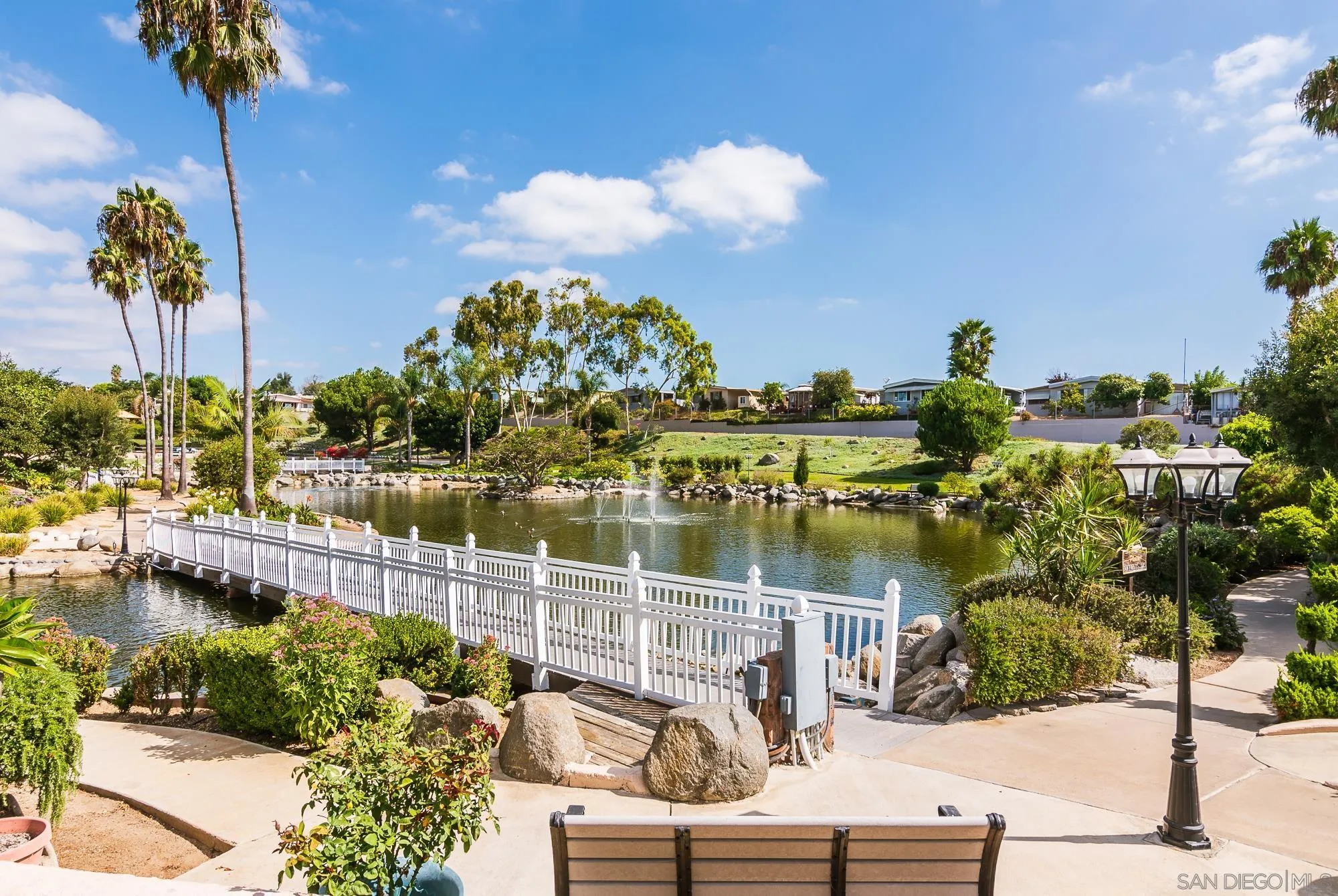 262 Brookside Lane Oceanside, CA 92056 - Photo 31 of 43 a view of a lake with a sitting area