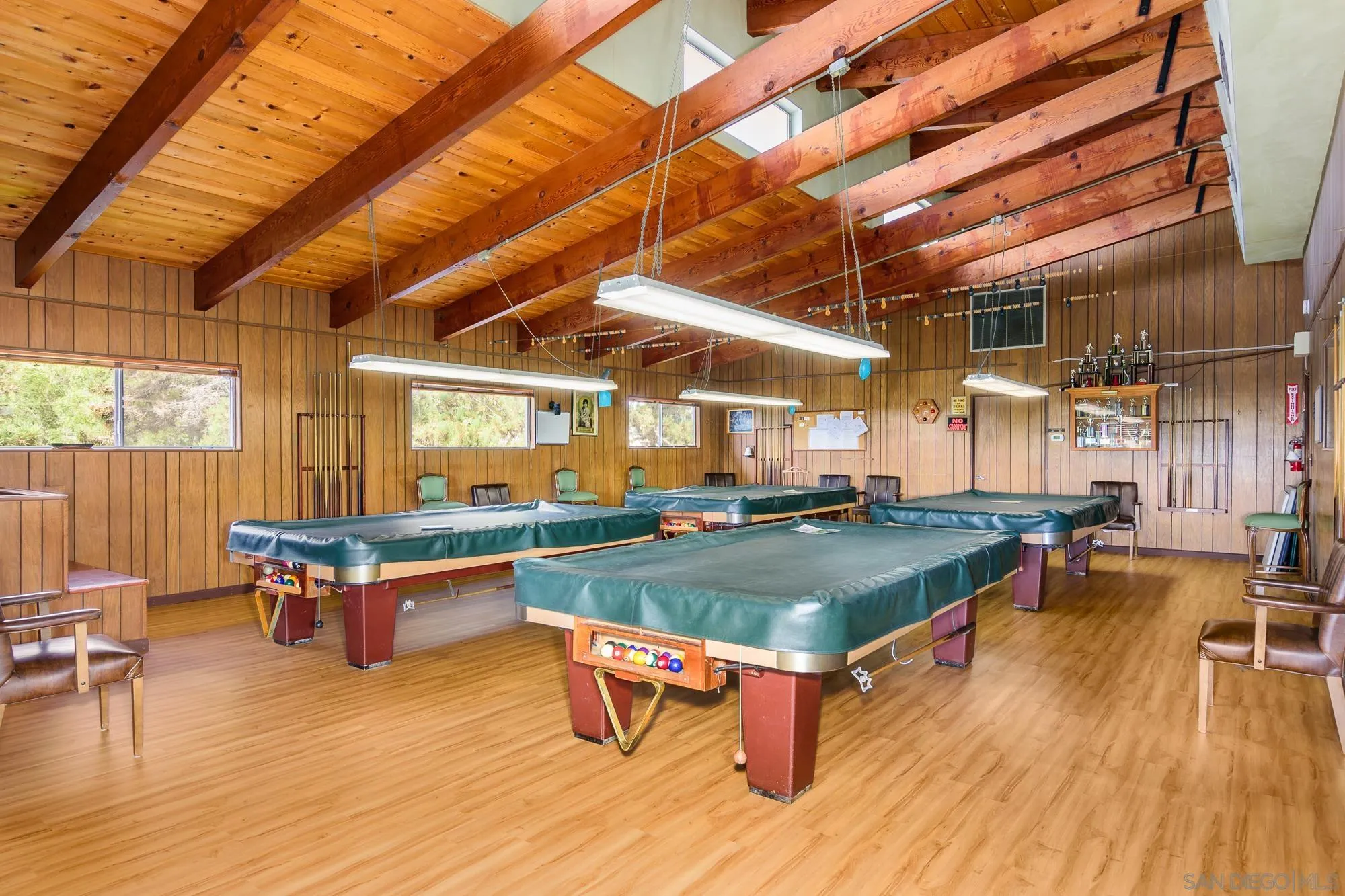 262 Brookside Lane Oceanside, CA 92056 - Photo 41 of 43 a living room filled with furniture pool table and a wooden floor