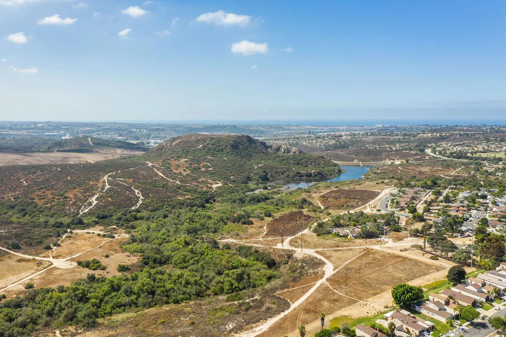 262 Brookside Lane Oceanside, CA 92056 - Photo 43 of 43 an aerial view of residential houses with outdoor space