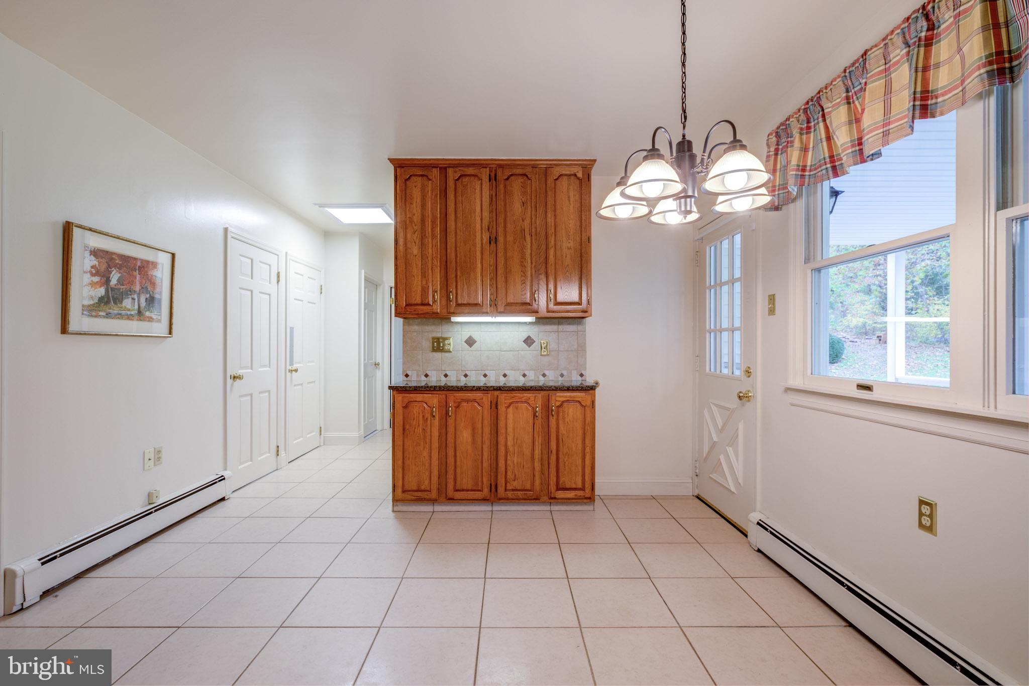 998 Broad Run Road West Chester, PA 19380 - Photo 54 of 71 Eating Area with Built in Cabinets