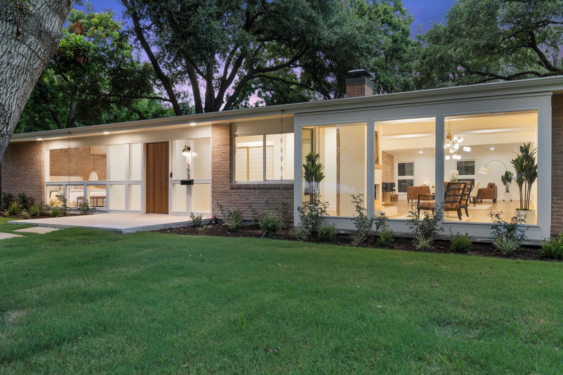 1503 East 15th Street Georgetown, TX 78626 - Photo 2 of 40 a view of backyard with large trees and plants