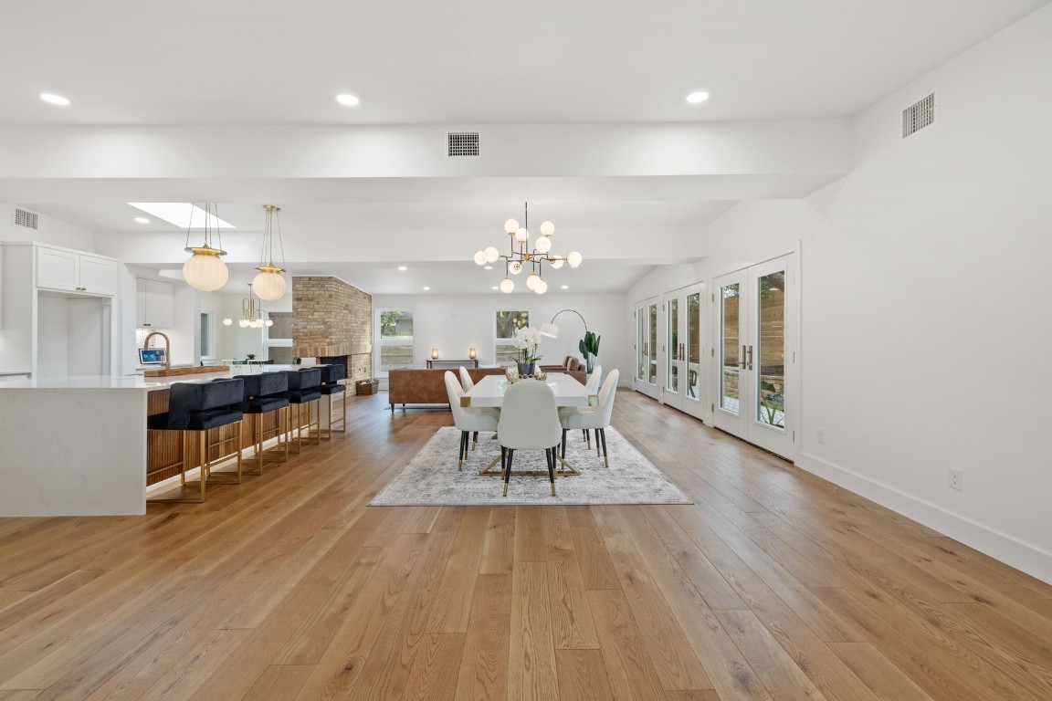 1503 East 15th Street Georgetown, TX 78626 - Photo 21 of 40 a view of a dining room with furniture and a chandelier