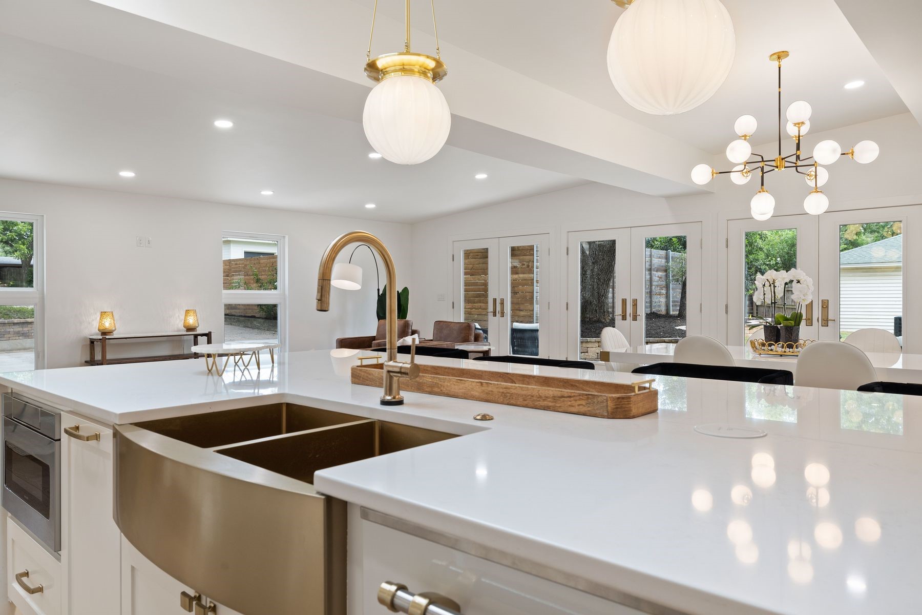 1503 East 15th Street Georgetown, TX 78626 - Photo 25 of 40 a view of a kitchen with a sink and chandelier