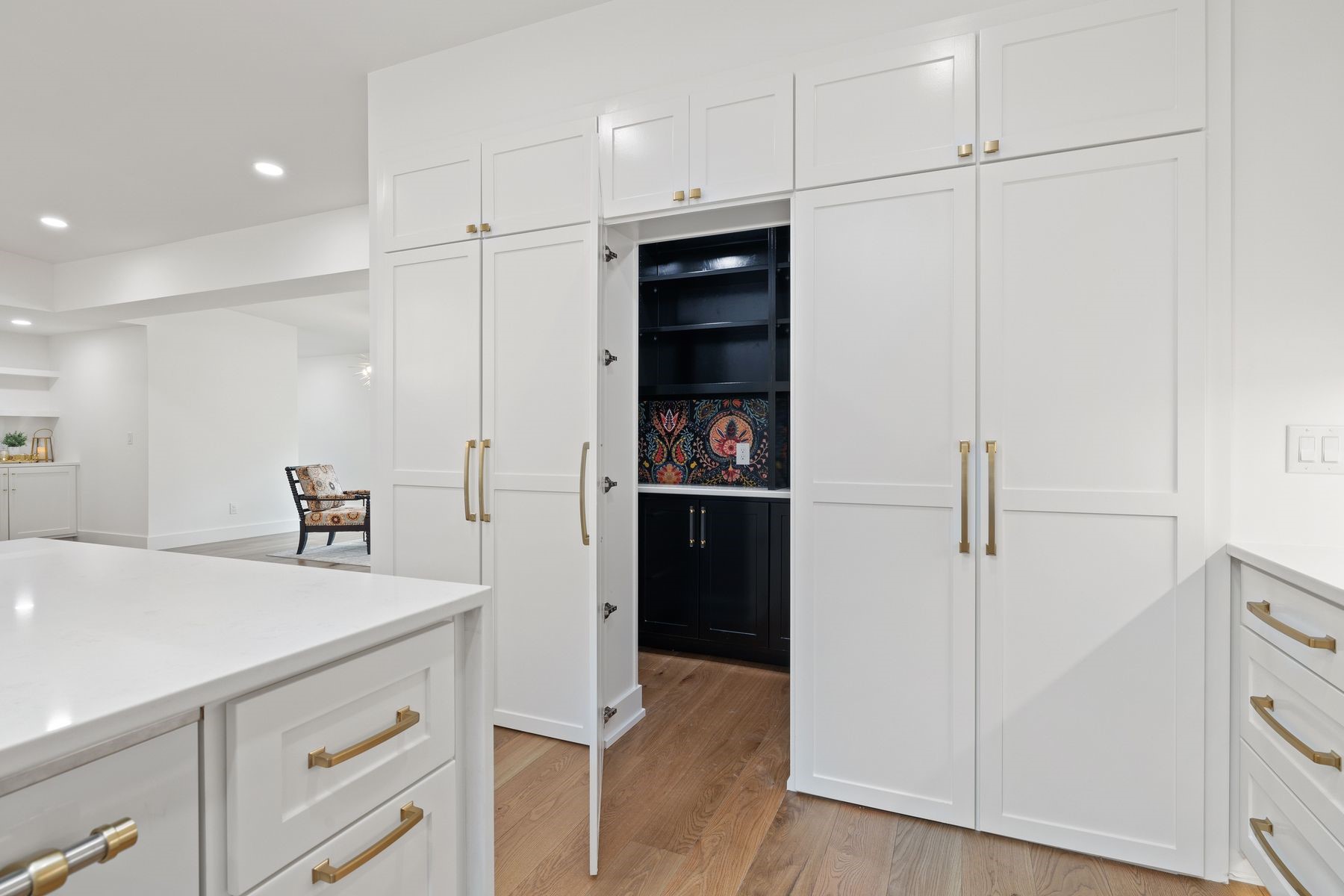 1503 East 15th Street Georgetown, TX 78626 - Photo 26 of 40 a kitchen with white cabinets and refrigerator