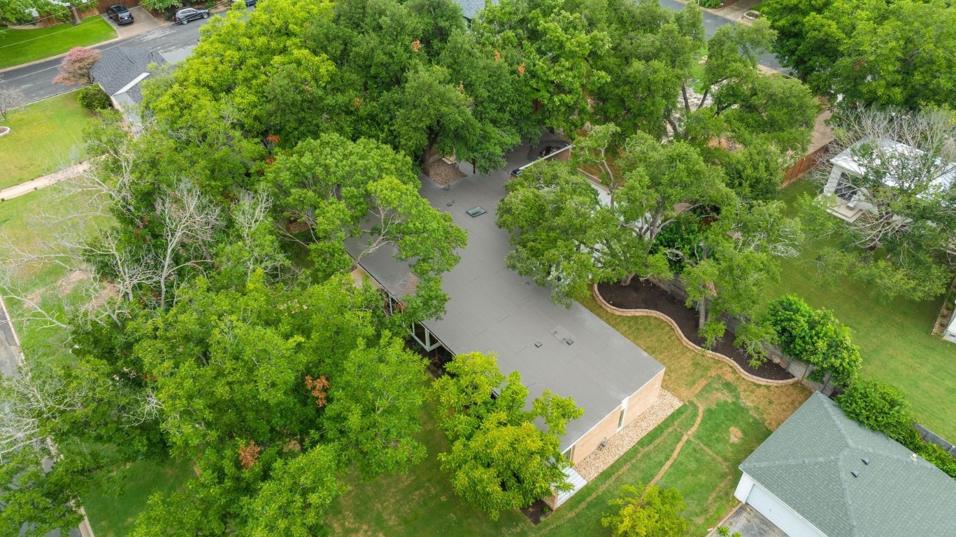 1503 East 15th Street Georgetown, TX 78626 - Photo 39 of 40 an aerial view of residential house with outdoor space and trees all around