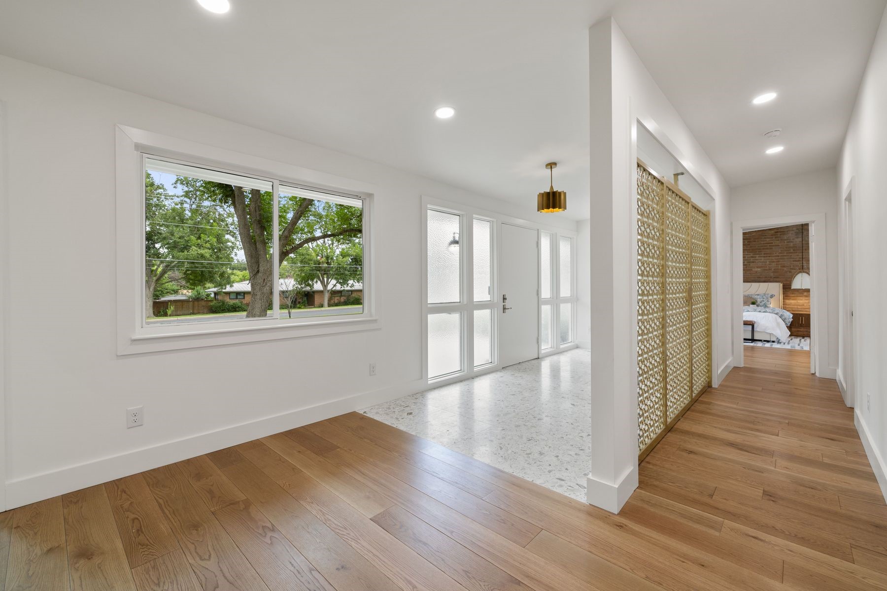 1503 East 15th Street Georgetown, TX 78626 - Photo 10 of 40 a view of a hallway with wooden floor and a window