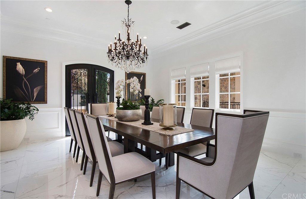 7 Rickie Lane Ladera Ranch, CA 92694 - Photo 14 of 36 a view of a dining room with furniture window and wooden floor