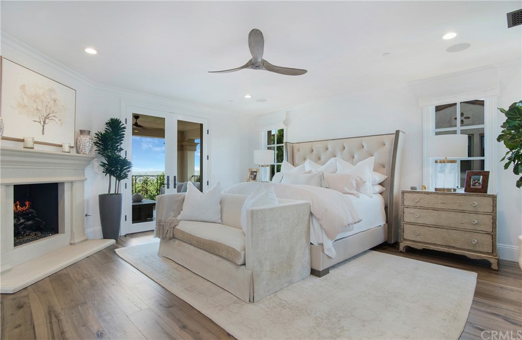 7 Rickie Lane Ladera Ranch, CA 92694 - Photo 19 of 36 a bed room with furniture and a fireplace