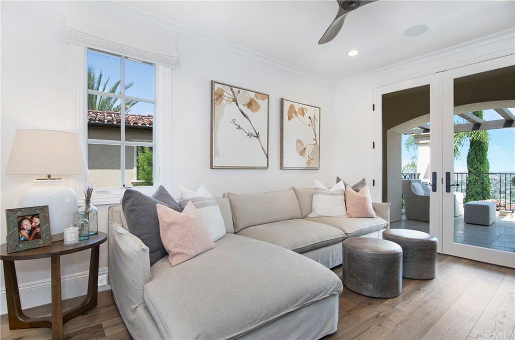 7 Rickie Lane Ladera Ranch, CA 92694 - Photo 22 of 36 a living room with furniture and a large window