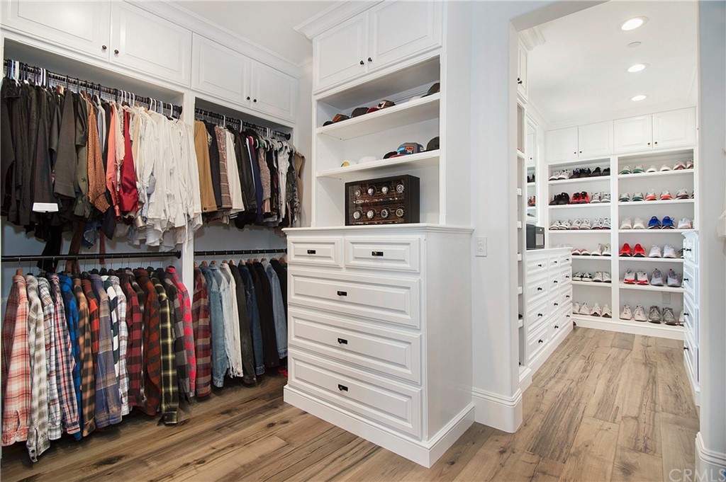 7 Rickie Lane Ladera Ranch, CA 92694 - Photo 23 of 36 a view of walk in closet with clothes and shoes