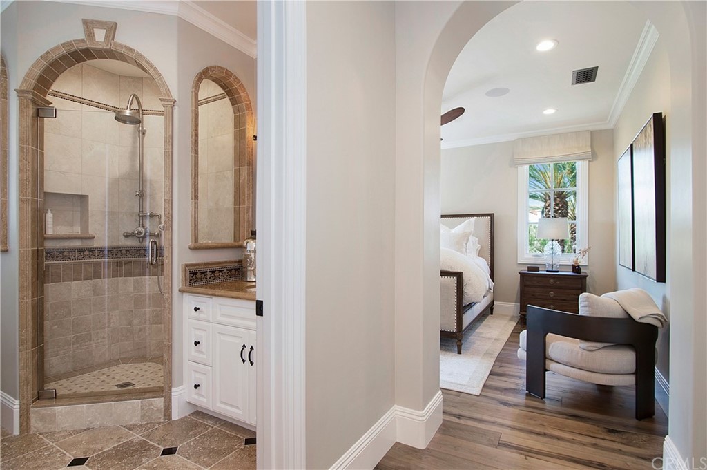 7 Rickie Lane Ladera Ranch, CA 92694 - Photo 26 of 36 a spacious bathroom with a glass door shower and a sink