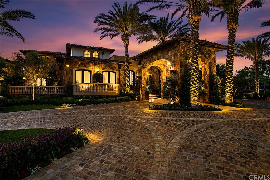 7 Rickie Lane Ladera Ranch, CA 92694 - Photo 29 of 36 a front view of a house with a yard