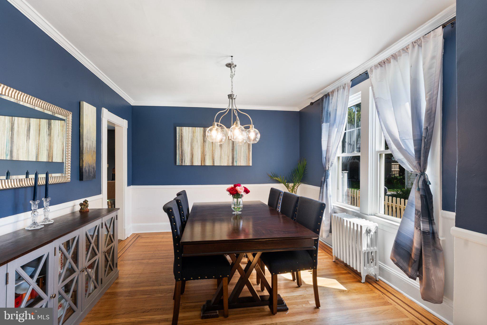 620 Murdock Road Baltimore, MD 21212 - Photo 8 of 41 Elegant dining space with blue accents.