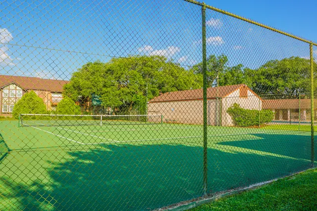 a view of a park and entertaining space