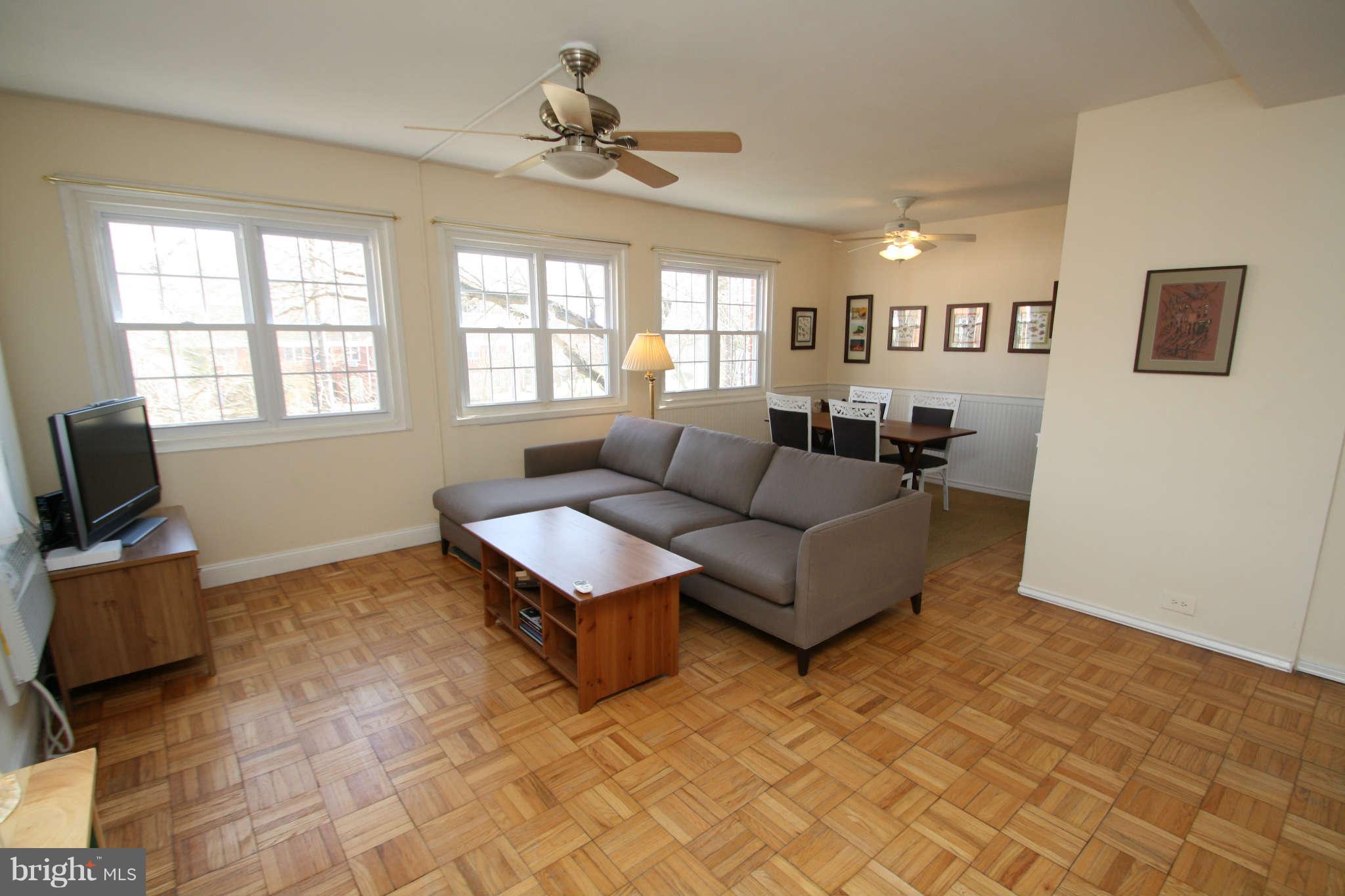 1634 Preston Road Alexandria, VA 22302 - Photo 1 of 19 a living room with furniture and a flat screen tv
