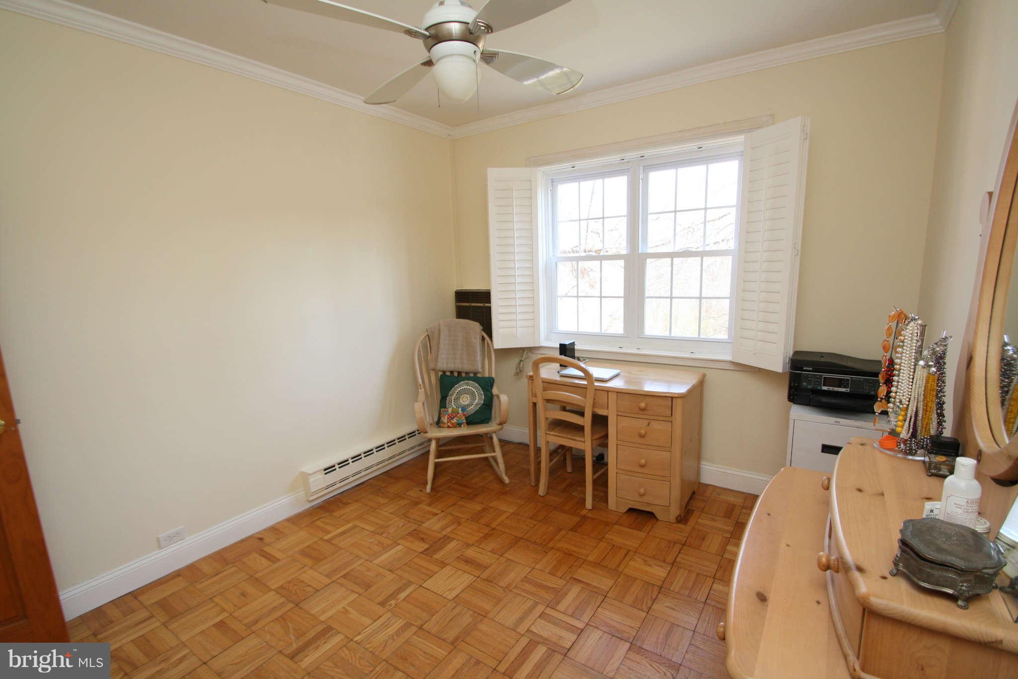 1634 Preston Road Alexandria, VA 22302 - Photo 14 of 19 a view of a workspace with furniture and a window