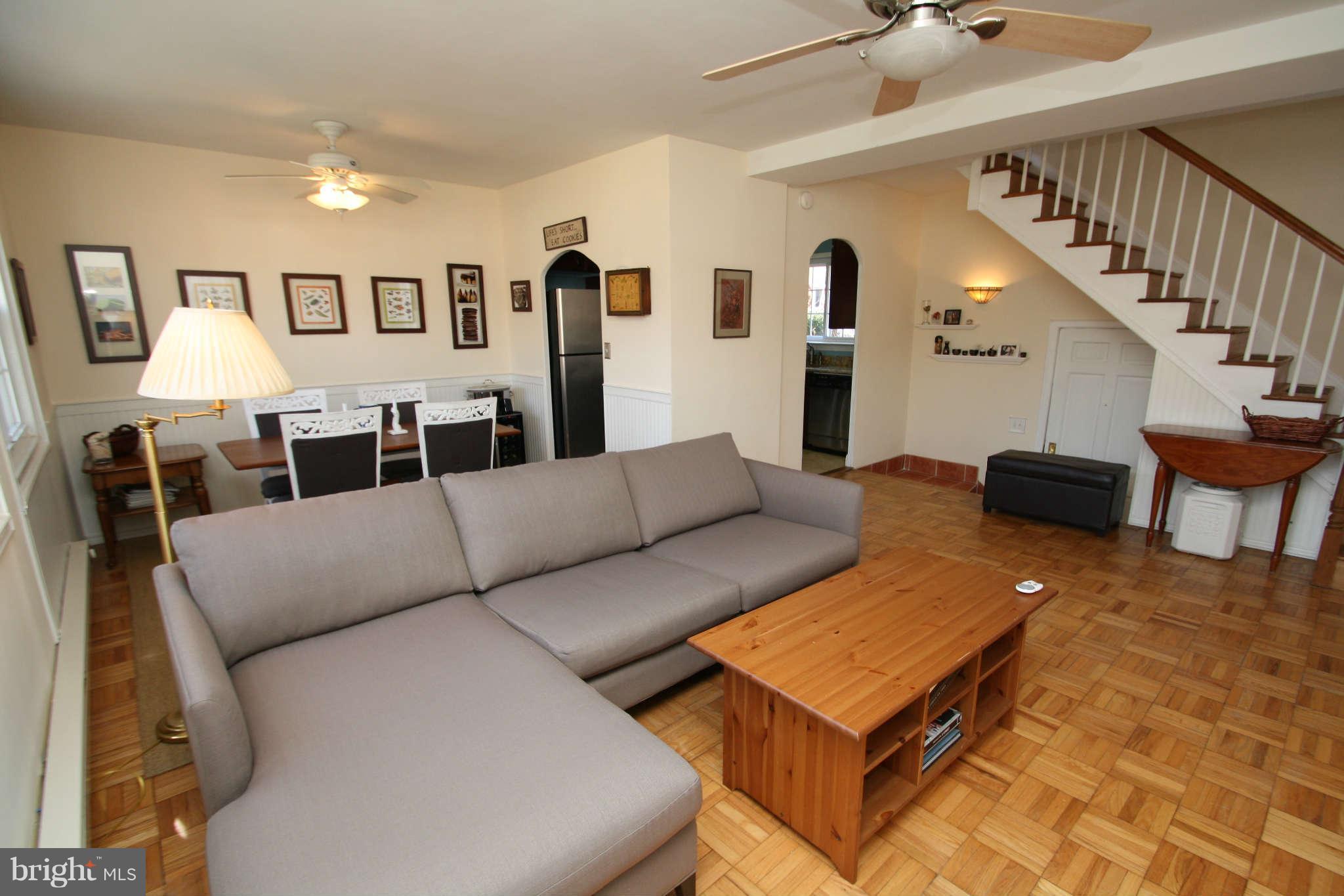 1634 Preston Road Alexandria, VA 22302 - Photo 3 of 19 a living room with furniture ceiling fan and a rug